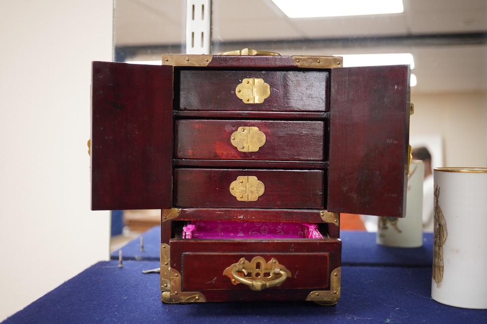 A Chinese brass mounted jewellery cabinet, decorated with enamel plaques. 21cm high. Condition - generally good